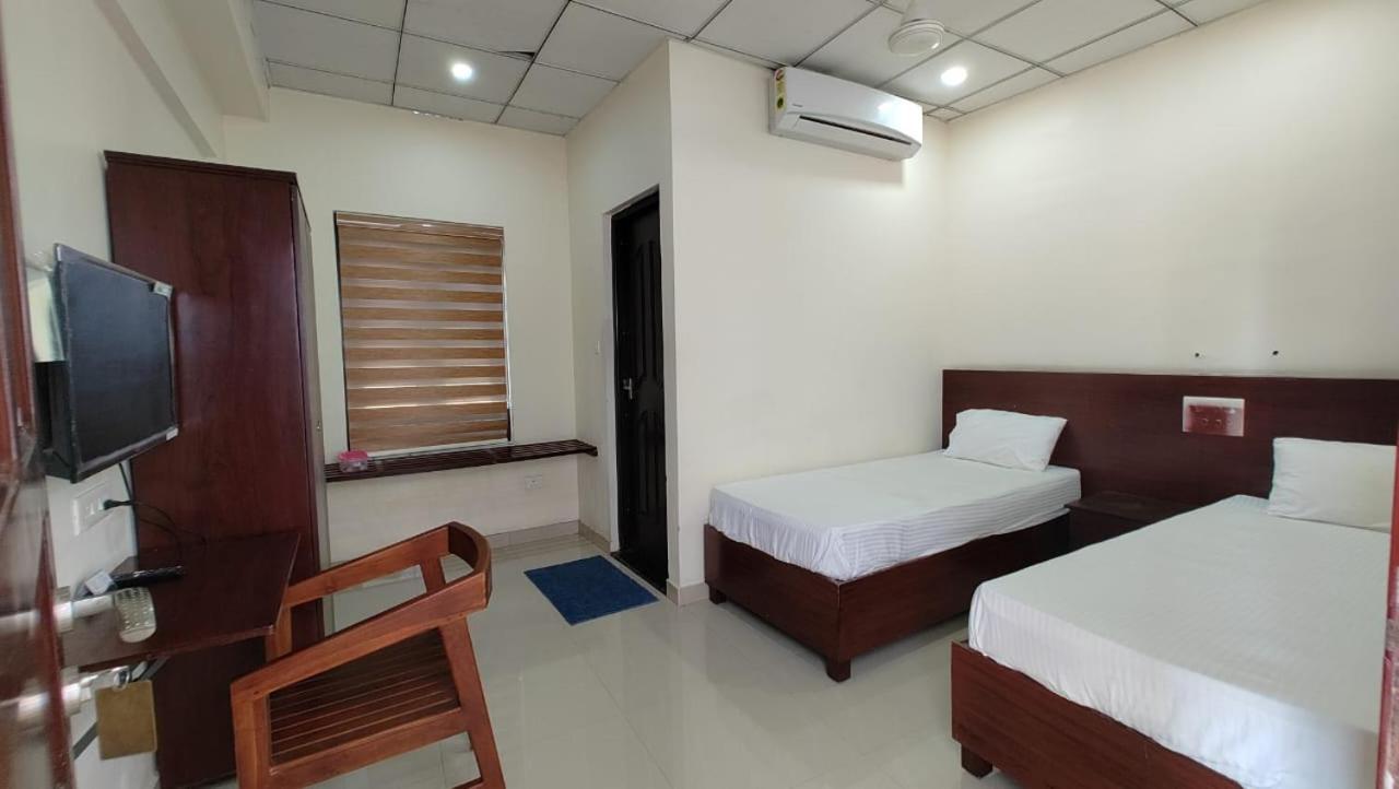 Masterkey Deluxe Rooms Kochi Exteriör bild
